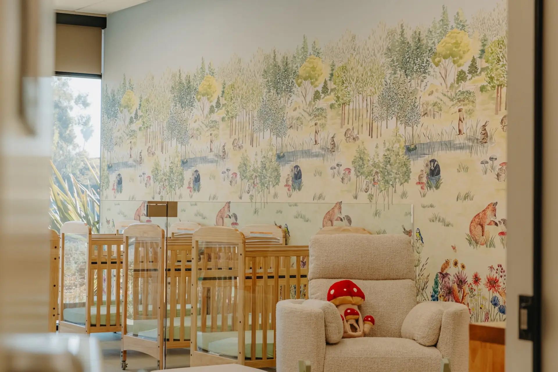 Infant classroom with woodland mural