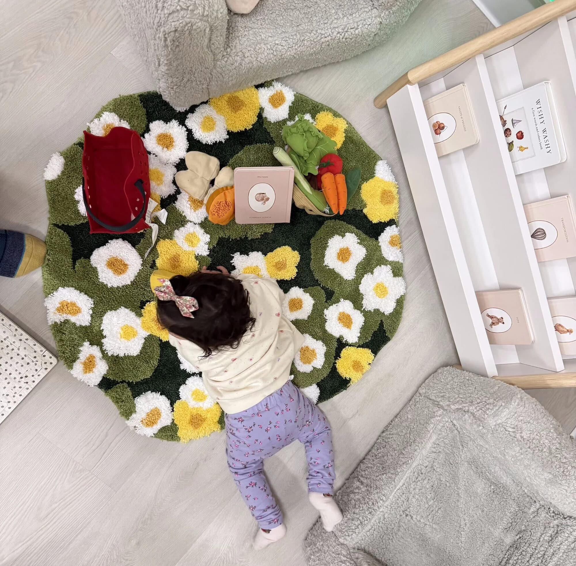 Baby exploring a sensory rug